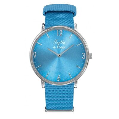 Reloj L'Imprévu para mujer con fondo azul turquesa y correa NATO azul