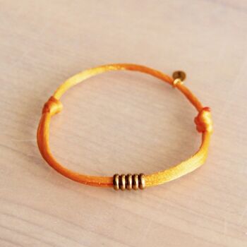 Bracelet satin avec anneaux – orange/or 1