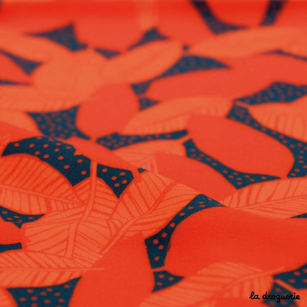 Tissu au mètre "Girl on fire" Rouges