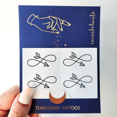 Tatuaggio temporaneo del segno dell'infinito con una freccia (set da 4)