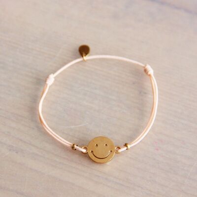 Bracelet élastique avec smiley – pêche/or