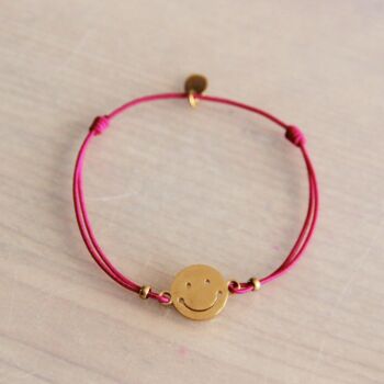 Bracelet élastique avec smiley – rose vif/or