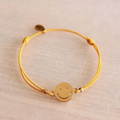 Elastic bracelet with smiley – yellow/gold