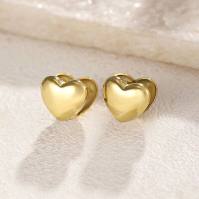 Gold thick hoop earrings with smooth hearts