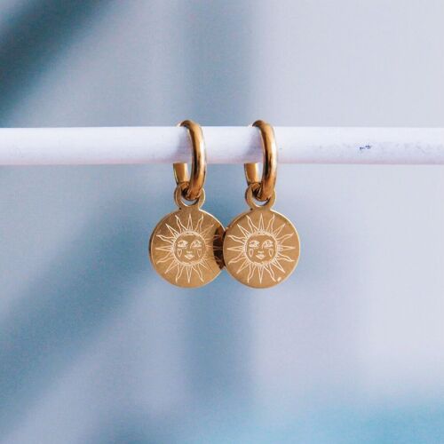 Stainless steel hoop earrings with round charm and sun - gold