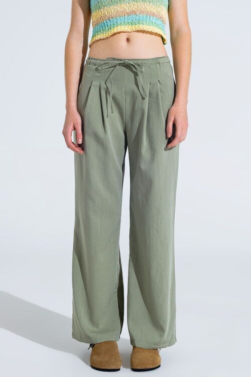 Light Green Relaxed Pants With Drawstring Closing And Side Pockets