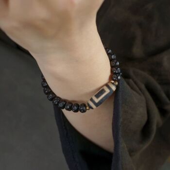 Bracelet de perles de coquille de noix de coco noire avec perle tibétaine Dzi 2
