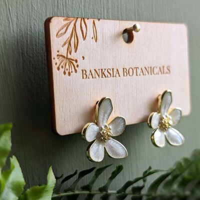 Aretes de flores llamativos de oro