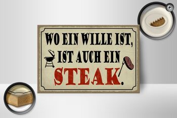 Panneau en bois indiquant 18x12 cm où se trouve une décoration de grill à steak 2