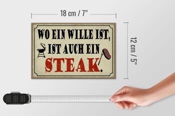 Panneau en bois indiquant 18x12 cm où se trouve une décoration de grill à steak 4
