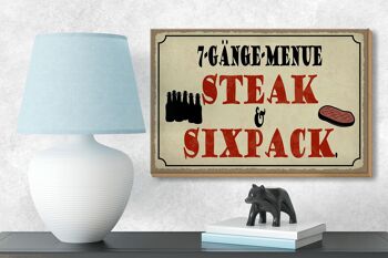 Panneau en bois indiquant 18x12cm menu 7 plats steak six pack grill 3