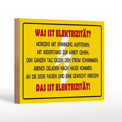 Cartel de madera que dice 18x12cm ¿Qué es la electricidad?
