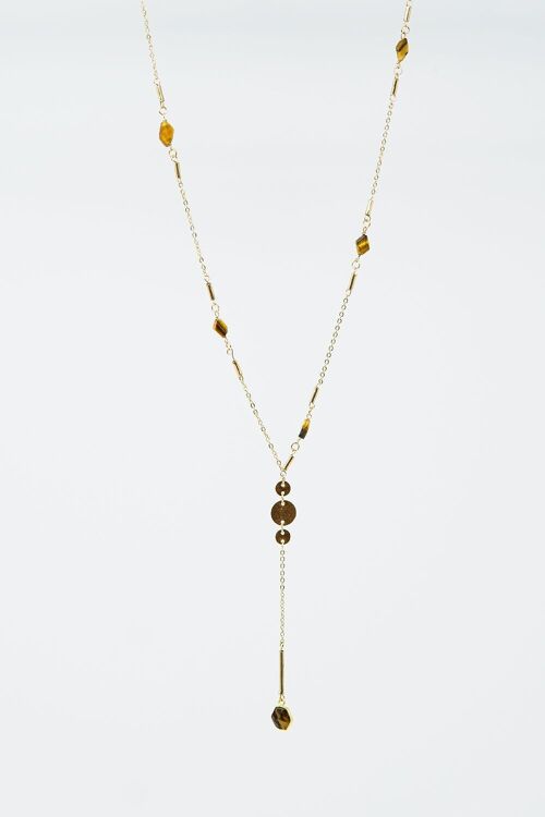 Golden necklace with stone detail and pendant