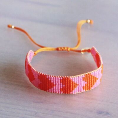 Pulsera tejida con corazones - naranja/rosa