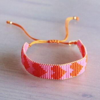 Bracelet tissé avec coeurs - orange/rose 1