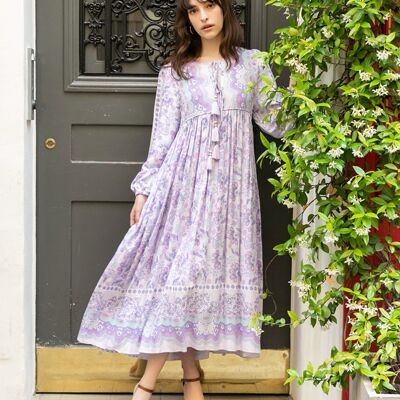 Long bohemian print dress with pompoms,