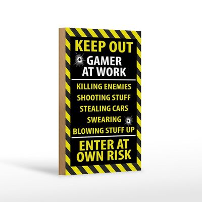 Cartello in legno con scritta "Tenere lontano i giocatori al lavoro" a proprio rischio e pericolo