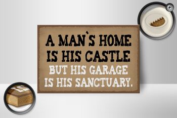Panneau en bois disant 18x12 cm La maison de l'homme est sa décoration de garage de château 2