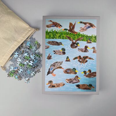 Puzzle di anatre di latta