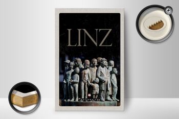 Panneau en bois voyage 12x18 cm Linz Autriche sculpture personnes 2
