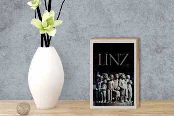 Panneau en bois voyage 12x18 cm Linz Autriche sculpture personnes 3