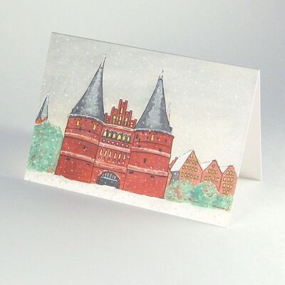 Cartolina di Natale: Holstentor a Lubecca sotto la neve