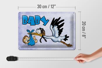 Plaque en tôle bébé 30x20cm cigogne amène un enfant en bleu 4