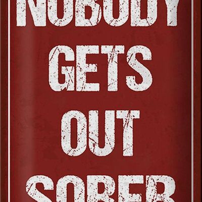 Metal sign saying 20x30cm nobody gets out sober