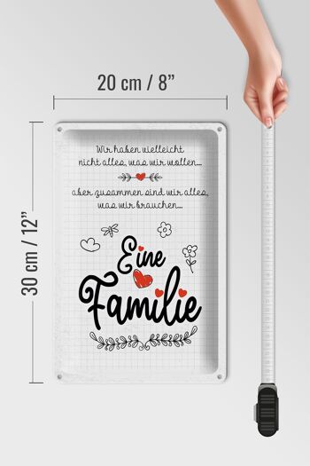 Plaque en tôle disant Famille Nous n'avons pas tout sauf 20x30cm 4