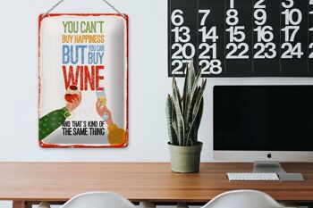 Plaque en tôle disant "Le vin ne peut pas acheter le bonheur mais le vin" 20x30cm 3