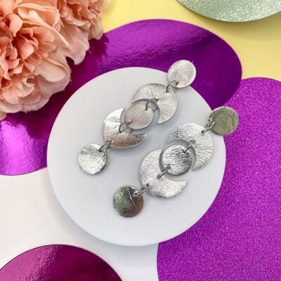 Magic earrings in silver leather