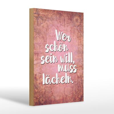 Holzschild Spruch 20x30cm wer schön sein will muss lächeln