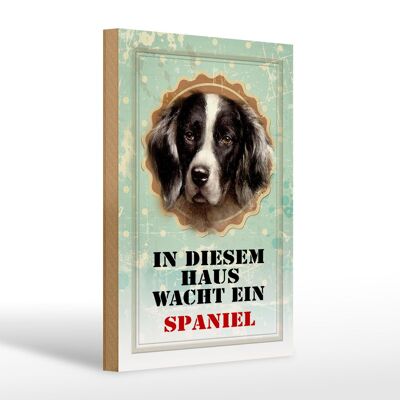 Holzschild Hund 20x30cm in diesem Haus wacht ein Spaniel