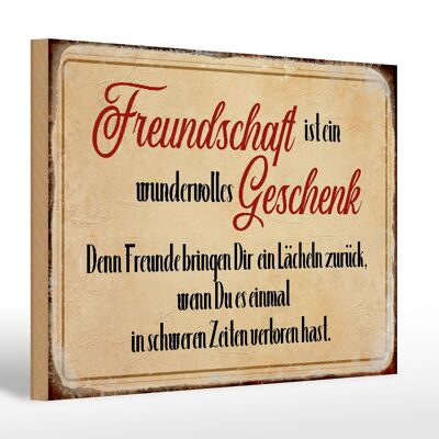 Wooden sign saying 30x20cm friendship is a gift