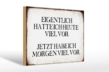 Panneau en bois indiquant que 30x20 cm avait en fait beaucoup à faire aujourd'hui 1