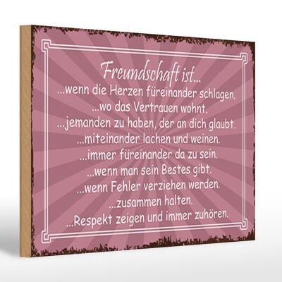 Cartel de madera que dice 30x20cm La amistad es cuando los corazones