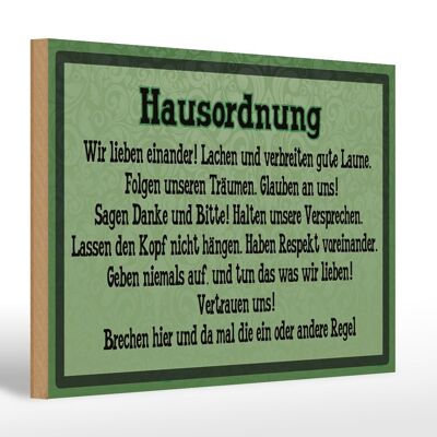 Cartello in legno 30x20 cm con scritto "Regole della casa: ci amiamo".