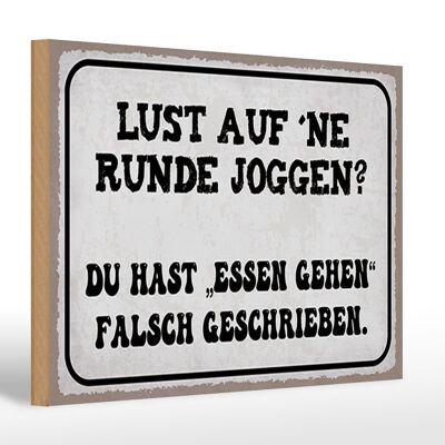 Cartello in legno rotondo 30x20 cm con scritta "piacere fare jogging andare mangiare".