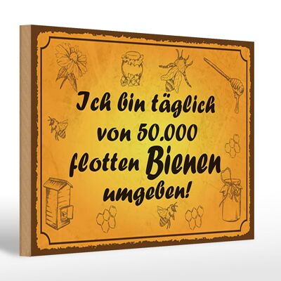 Wooden sign saying 30x20cm surrounded by 50000 lively bees