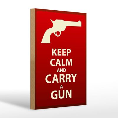 Cartel de madera que dice 20x30cm Mantenga la calma y lleve un arma.