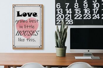 Panneau en bois 20x30 cm indiquant que l'amour pousse mieux dans les petites maisons 3