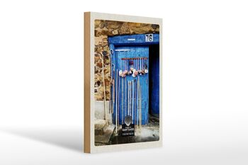 Panneau de voyage en bois 20x30cm, coquilles d'espagne, porte bleue, canne de marche 1