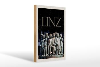 Panneau en bois voyage 20x30cm Linz Autriche sculpture personnes 1