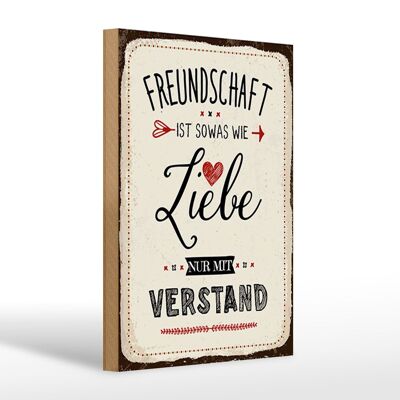 Wooden sign saying 20x30cm friendship is something like love