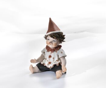 Petite figurine en porcelaine Pinocchio 9