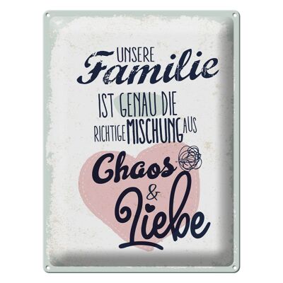 Tin sign saying Our Family Chaos Love Heart 30x40cm