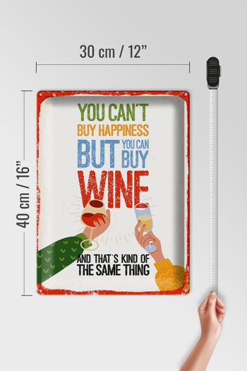 Plaque en tôle disant "Le vin ne peut pas acheter le bonheur mais le vin" 30x40cm 4