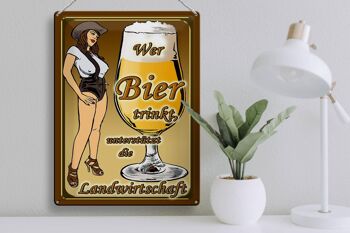 Plaque en tôle Pinup 30x40cm qui boit de la bière soutient le pays 3