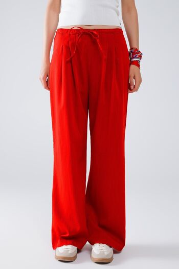 Pantalon décontracté rouge avec fermeture à cordon et poches latérales 1