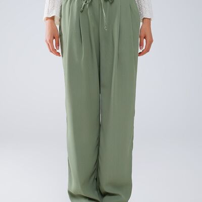 Pantaloni Di Colore Verde Con Tasche Frontali E Chiusura Con Coulisse